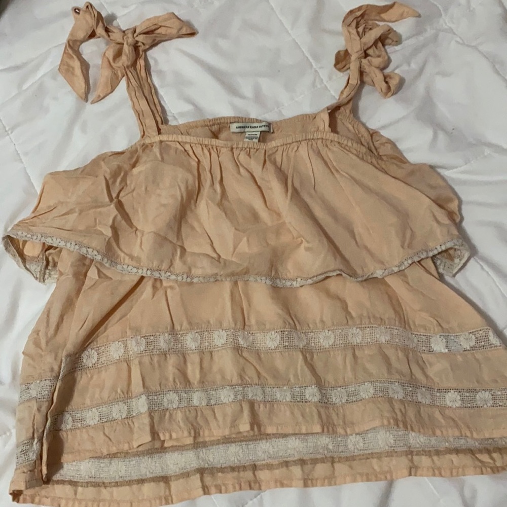 Orange creme ruffled tie tank top